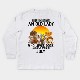 Never Underestimate An Old July Lady Who Loves Dogs Kids Long Sleeve T-Shirt